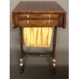 A 19TH CENTURY MAHOGANY WORK/SIDE TABLE, with drop leafs above real and false drawers and fabric