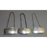 THREE 19TH CENTURY SILVER DECANTER 'SHERRY' LABELS With incised lettering on bow fronted plaques.