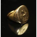 AN 18CT GOLD SIGNET RING, having an oval bezel engraved with a griffin's head (worn). Hallmarked