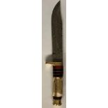 A 20TH CENTURY AMERICAN HORN AND DAMASCUS STEEL BOWIE KNIFE The horn handle set with brass fittings,