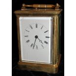 A 19TH CENTURY FRENCH GILT BRASS REPEATING CARRIAGE CLOCK Having four bevelled glass panels and an