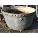 A LARGE IMPRESSIVE LATE 19TH/20TH CENTURY CAST IRON STUDDED CAULDRON. (128cm x h 82cm)