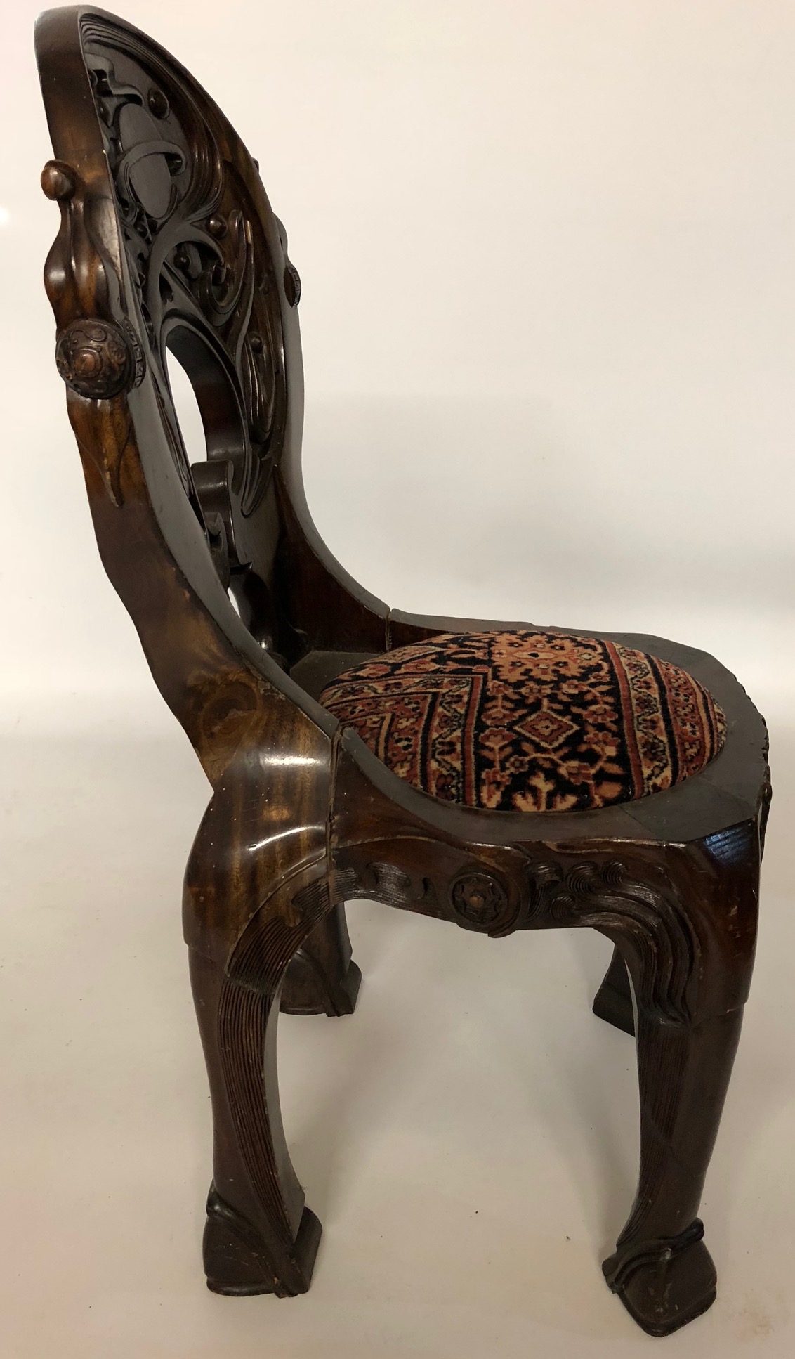 AN UNUSUAL SET OF SIX 20TH CENTURY CARVED HARDWOOD ORGANIC FORM CHAIRS The backs caved with orbiting - Image 3 of 4