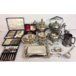 A QUANTITY OF VINTAGE SILVER PLATED ITEMS Coffee pot and spirit kettle, two entree dishes, fish