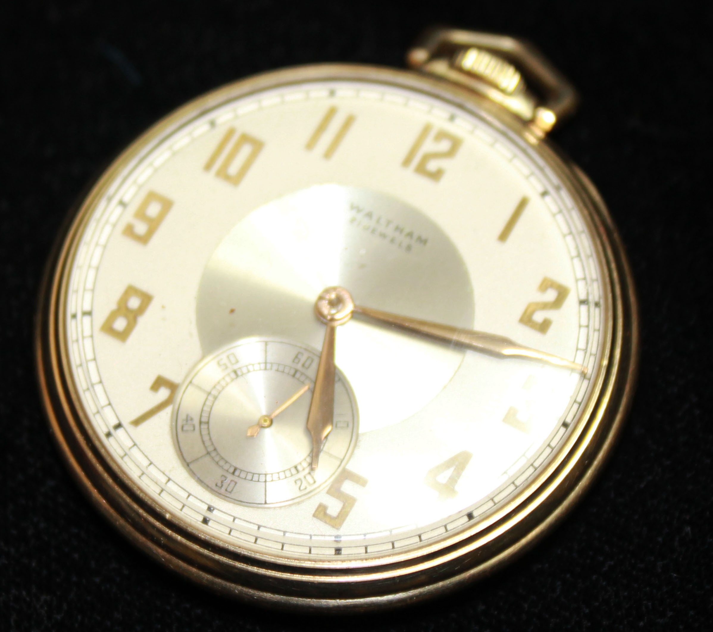 WALTHAM, A 20TH CENTURY 10CT GOLD FILLED GENT'S SLIMLINE POCKET WATCH The silver tone dial with - Image 2 of 2