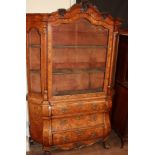 AN EARLY 19TH CENTURY DUTCH WALNUT AND FLORAL MARQUETRY INLAID DISPLAY CABINET With carved foliate