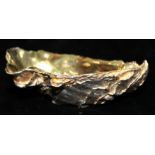 A 20TH CENTURY WHITE METAL AND GILT OYSTER DISH Cast with a realistic shell design to exterior,