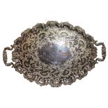 AN EARLY 20TH CENTURY AMERICAN SILVER PLATED SERVING TRAY Scalloped edge design with scrolls and