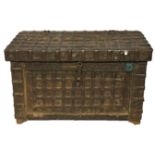 A 17TH CENTURY STYLE METAL BOUND CHEST Teak lined, with cast iron carry handles and locking clasp.