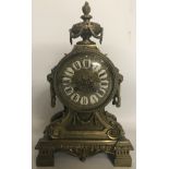 A GOOD VICTORIAN BRONZE LION MASK MANTLE CLOCK With twin train movement, enamelled Roman numerals,