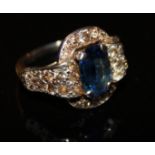 AN EARLY 20TH CENTURY ART DECO STYLE PLATINUM, SAPPHIRE AND DIAMOND RING The single octagon cut