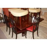 A LARGE 19TH CENTURY MAHOGANY BREAKFAST TABLE The square top, raised on carved column and platform