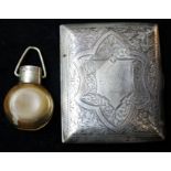 AN EDWARDIAN SILVER CIGARETTE CASE Having scrolled decoration and hallmarked Birmingham, 1908,