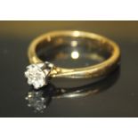 A 20TH CENTURY 18CT GOLD AND DIAMOND SOLITAIRE RING Having a single rounded cut diamond, claw set in