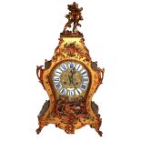 A.D. MOUGIN, PARIS, A LATE 19TH/EARLY 20TH CENTURY GILT METAL MOUNTED MANTEL CLOCK The wooden case