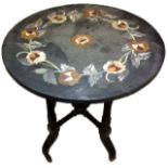 A VICTORIAN EBONISED PLANT TABLE WITH A LATER MARBLE TOP Circular shape with reeded legs and brass