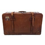 AN EARLY 20TH CENTURY TAN LEATHER SUITCASE With polished chrome locks. (75cm x 40cm) Condition: