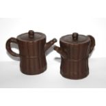 TWO CHINESE YIXING WARE TERRACOTTA POTTERY MINIATURE TEAPOTS Having a waisted bamboo design to body.