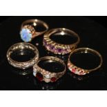 A COLLECTION OF VINTAGE 9CT GOLD AND GEM SET RINGS To include a cabochon cut opal triplet, claw