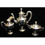 A 20TH CENTURY ITALIAN SILVER BACHELOR'S COFFEE SERVICE Comprising a coffee pot, cream jug and