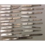 A COLLECTION OF TWENTY VICTORIAN AND LATER SILVER AND MOTHER OF PEARL POCKET FRUIT KNIVES Each blade