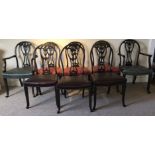 A SET OF EIGHT 19TH CENTURY MAHOGANY ADAMS DESIGN DINING CHAIRS To include two carvers, the carved