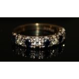 AN 18CT GOLD, SAPPHIRE AND DIAMOND HALF ETERNITY RING Having five round cut sapphires interspersed