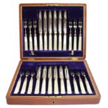 A CASED SET OF TWELVE EARLY 20TH CENTURY SILVER PLATED AND MOTHER OF PEARL FRUIT KNIVES AND FORKS