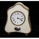 A 19TH CENTURY IVORY AND SILVER MOUNTED BOUDOIR CLOCK Having a domed top with waisted sides, edged