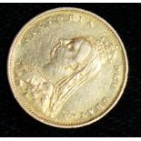 A VICTORIAN 22CT GOLD HALF SOVEREIGN COIN Dated 1887, bearing a portrait of Queen Victoria with