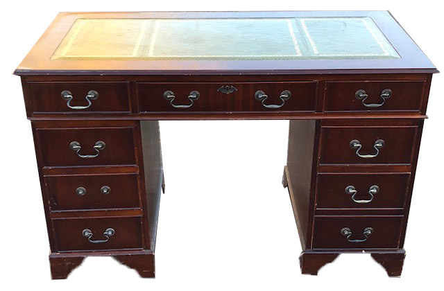 A GEORGIAN DESIGN MAHOGANY PEDESTAL DESK With a tooled tan leather writing surface above arrangement