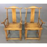 A PAIR OF 19TH CENTURY CHINESE HARDWOOD YOKE BACK OPEN ARMCHAIRS. (58cm x 43cm x 110cm)