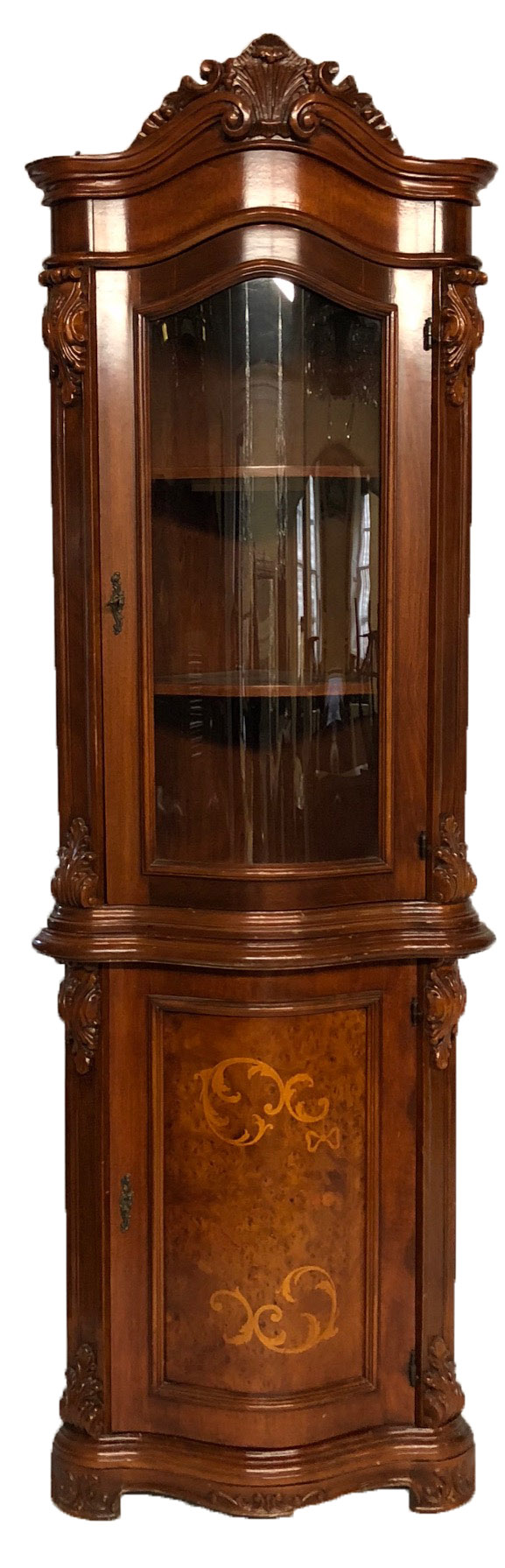 A 20TH CENTURY VICTORIAN DESIGN MAHOGANY SERPENTINE CORNER CUPBOARD With carved cornice and glazed