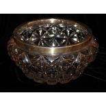 JAMES DIXON & CO., AN EARLY 20TH CENTURY SILVER AND CUT LEAD CRYSTAL BOWL Having a wide silver