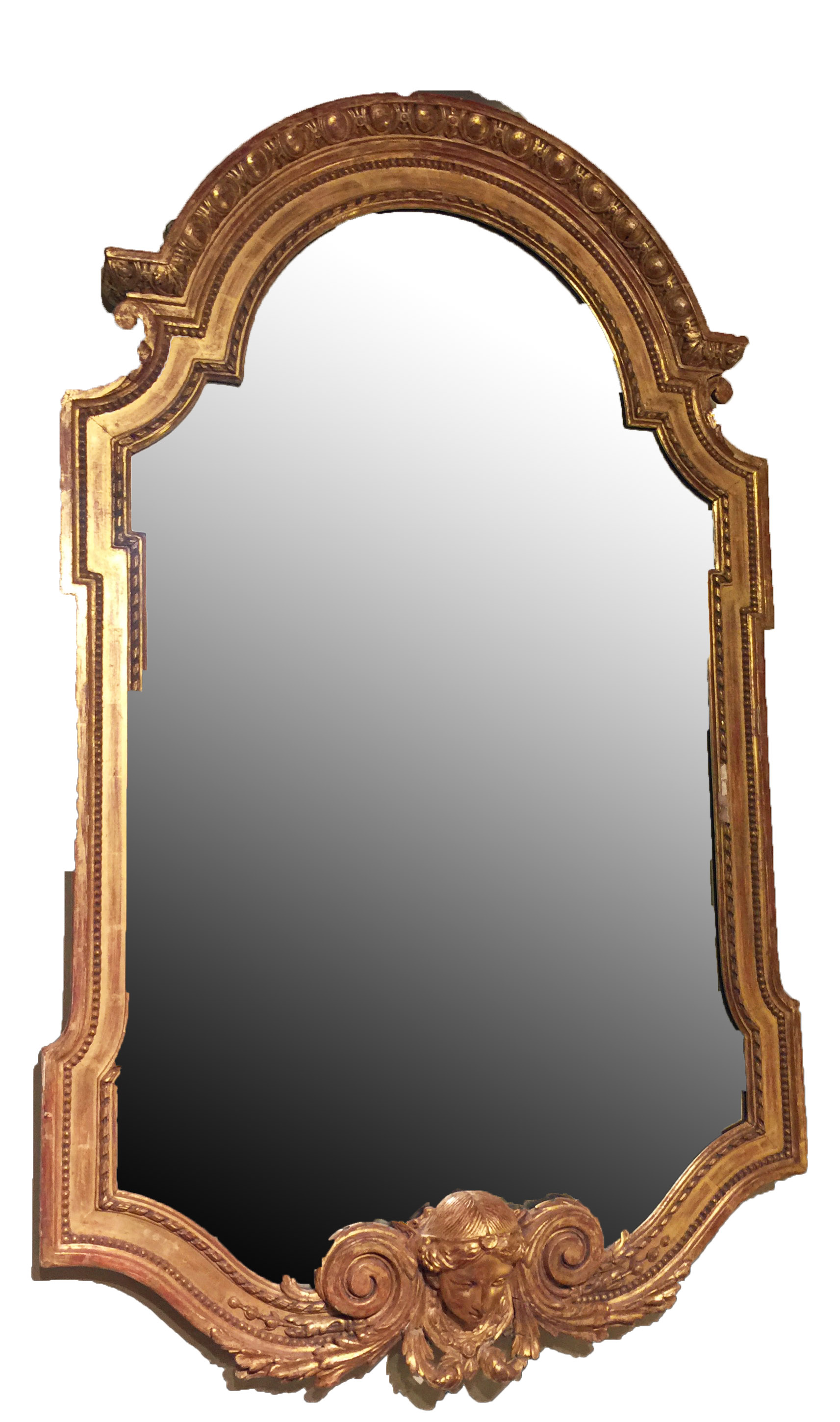 IN THE MANNER OF WILLIAM KENT, A LARGE 19TH CENTURY GILTWOOD FRAMED MIRROR The egg and dart dome