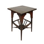 IN THE MANNER OF EDWARD WILLIAM GODWIN, A 19TH CENTURY WALNUT OCCASIONAL WORK TABLE The square top