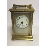 A 19TH CENTURY BRASS & SILVERED CASED CARRIAGE CLOCK. (12cm x 8cm x 7cm)