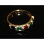 AN 18CT GOLD MULTI GEMSET FIVE STONE RING Comprising sapphires, emeralds and rubies spelling 'SERES'