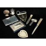 A COLLECTION OF VINTAGE SILVER ITEMS Including three bookmarks, letter opener, paperweight set