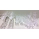 A COLLECTION OF 20TH CENTURY LEAD CRYSTAL GLASSWARE Comprising ten long stemmed red wine glasses and