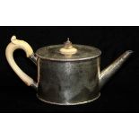 A VICTORIAN SILVER AND IVORY OVAL TEAPOT With an Ivory finial and handle and engraved with swags and