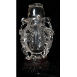 A ROCK CRYSTAL VASE AND COVER, CIRCA 1850 The clear stone carved with flowering prunus branches,