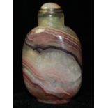 TWO BANDED AGATE SNUFF BOTTLES, CIRCA 1900 The undecorated bodies well hollowed.