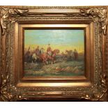 A 20TH CENTURY OIL ON PANEL Landscape, Arab warriors on horseback, held in a carved gilt frame,