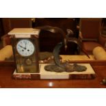 AN ART DECO BRONZE AND MARBLE FIGURAL MANTLE CLOCK The four glass case set with a circular white