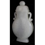 A FINE CELADON JADE MOON FLASK AND COVER Well carved to front and back with archaistic dragon