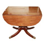 A GEORGIAN MAHOGANY PEMBROKE TABLE With single drawer and shaped drop leafs, raised on a turned