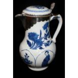 A KANGXI BLUE AND WHITE EWER AND COVER Decorated in bright blue with moulded panels of lotus
