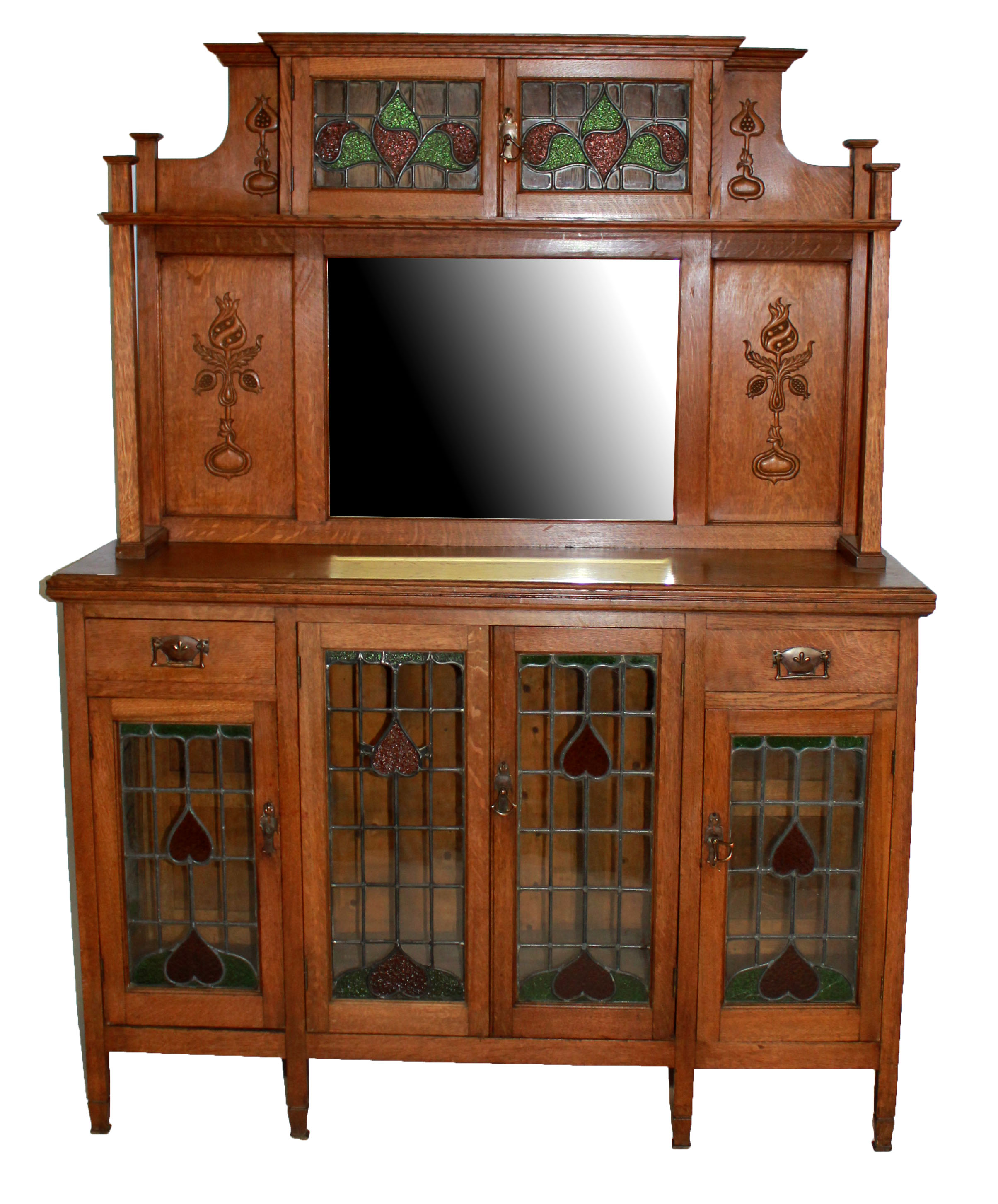 A 19TH CENTURY OAK AND STAINED GLASS ARTS AND CRAFTS MIRROR BACK SIDEBOARD Two small glazed