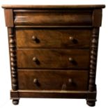 A VICTORIAN MAHOGANY CHEST OF DRAWERS Having a cushion frieze drawer above three long drawers with